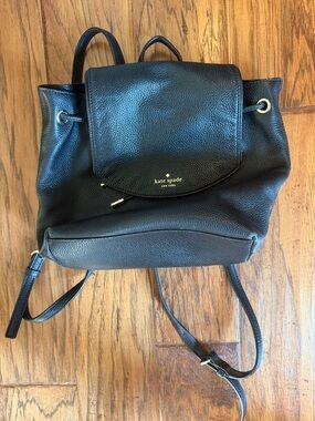 kate spade Black Pebbled Leather Drawstring Backpack with Flap